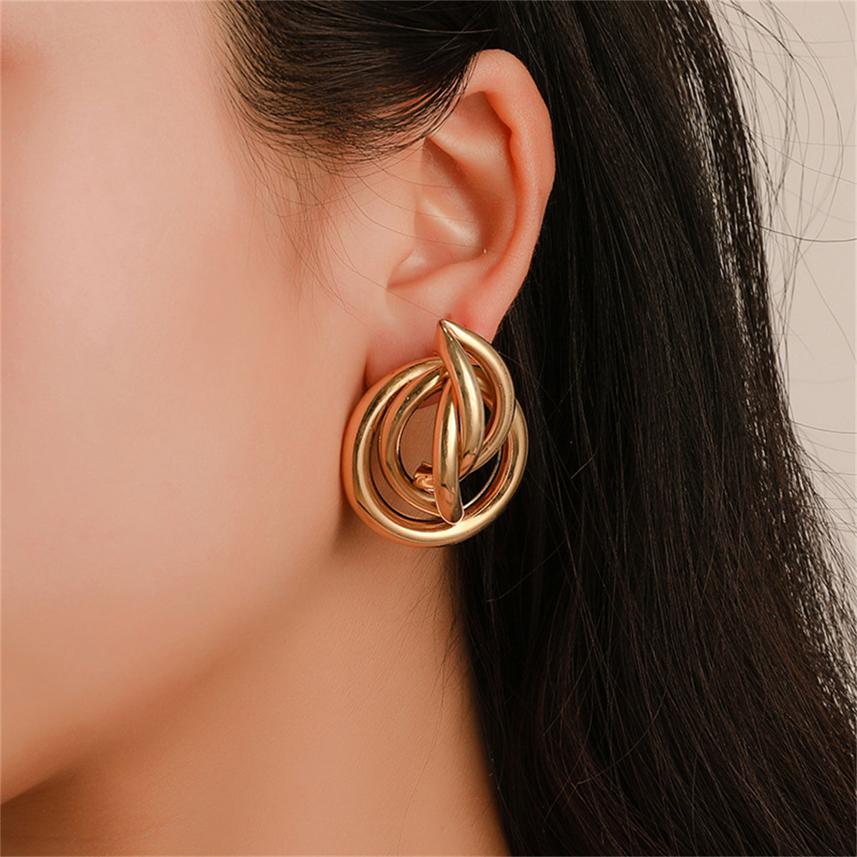 Elegant 18K gold-plated circular earrings, showcasing a stunning design perfect for any occasion.