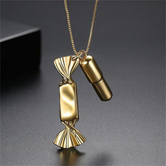 Eye-catching 18K gold-plated necklace showcasing a candy bar and pill pendant, blending fun and elegance in one piece.