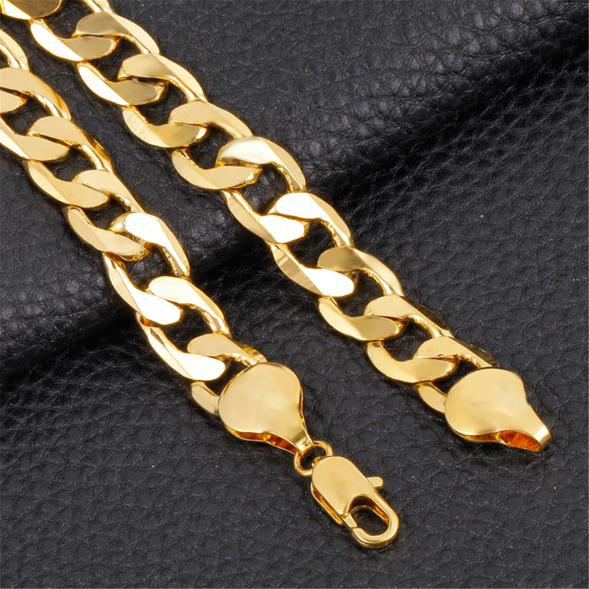 Eye-catching 18K gold-plated chunky curb chain bracelet with a significant large link, ideal for a stylish statement piece.