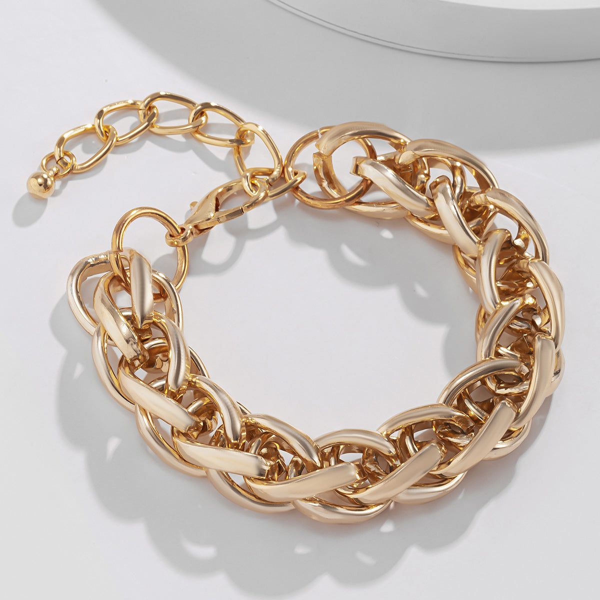 Eye-catching 18K gold-plated bracelet featuring a large link design, a stylish addition to any jewelry ensemble.