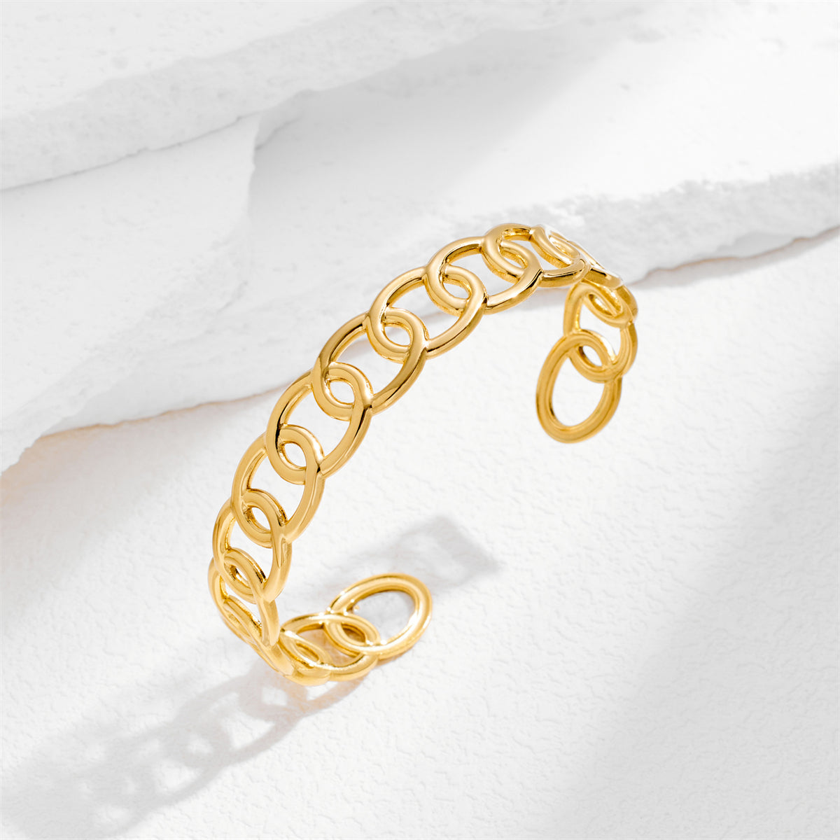 Luxurious 18K gold-plated curb chain bracelet with a striking link design, perfect for elevating your accessory game.