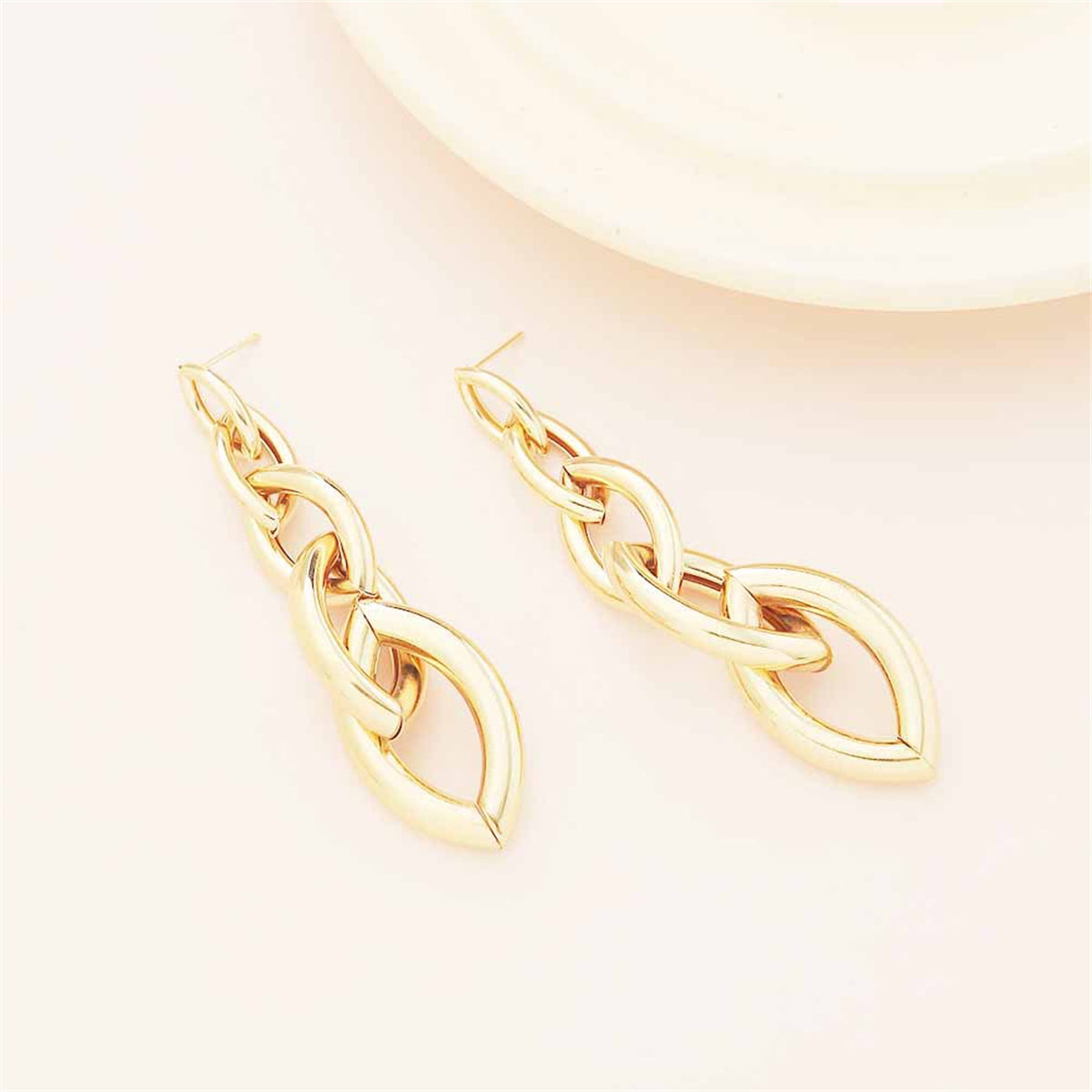 Luxurious 18K gold-plated chain drop earrings featuring a prominent oval design, a must-have accessory for any occasion.