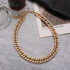 Bold 18K gold-plated curb chain necklace with a thick design, ideal for making a striking fashion statement.