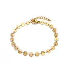 Stunning 18K gold-plated mariner chain anklet with a delicate disc charm, perfect for elevating any outfit.