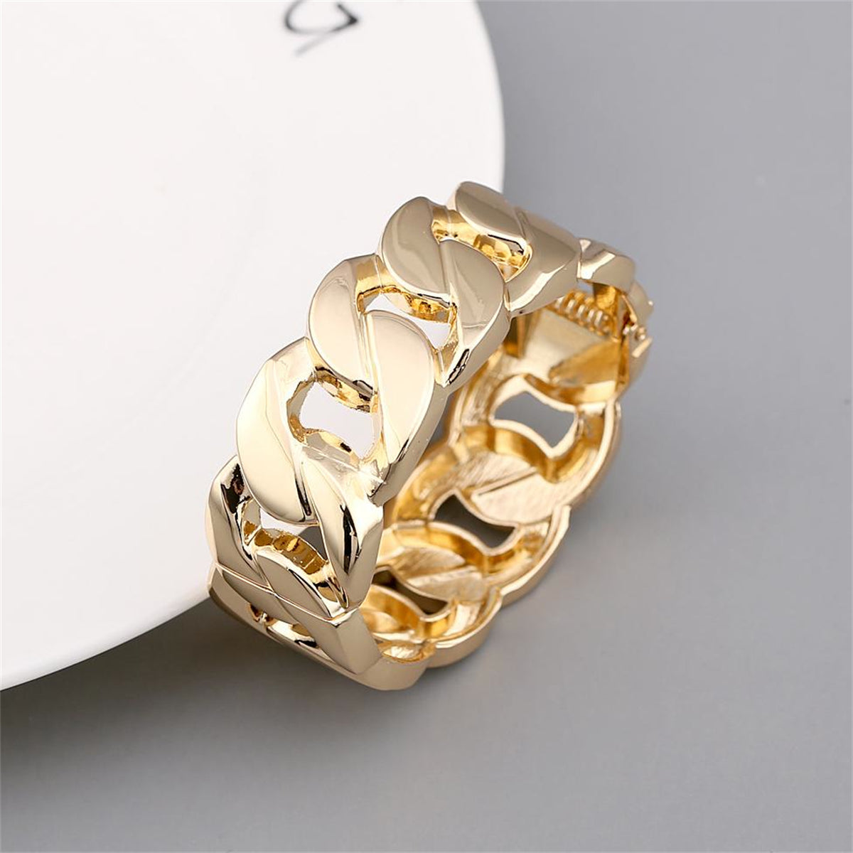 Chic 18K gold-plated curb-chain bangle showcasing a bold large link, a must-have for fashion-forward individuals.