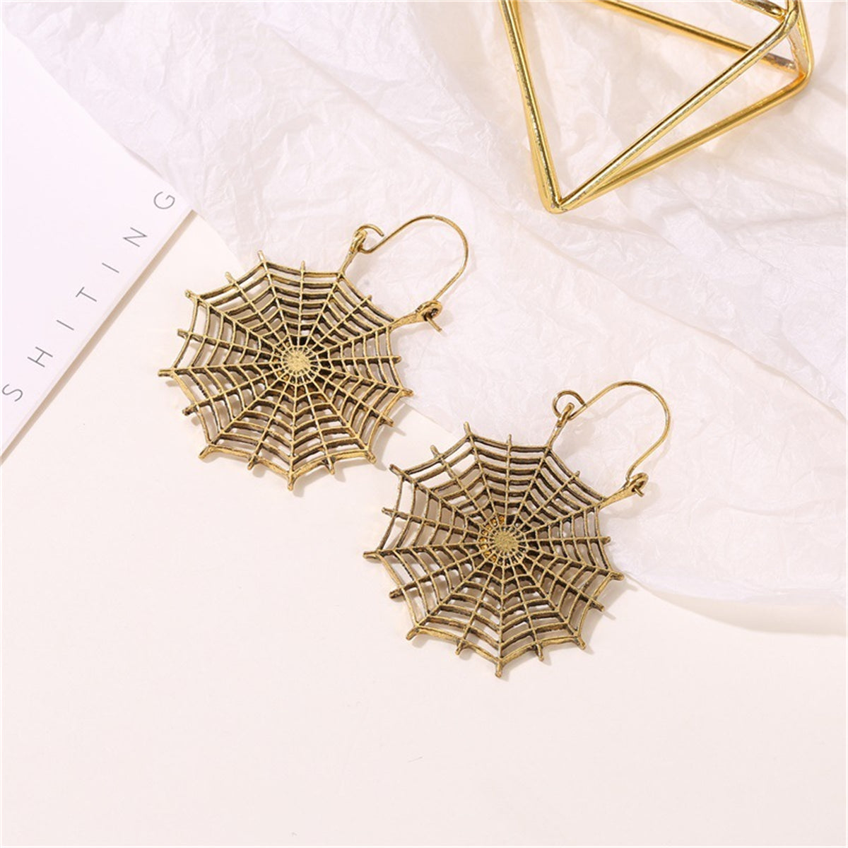 Beautiful 18K gold-plated cobweb earrings, perfect for Halloween, combining elegance with a playful, festive spirit.