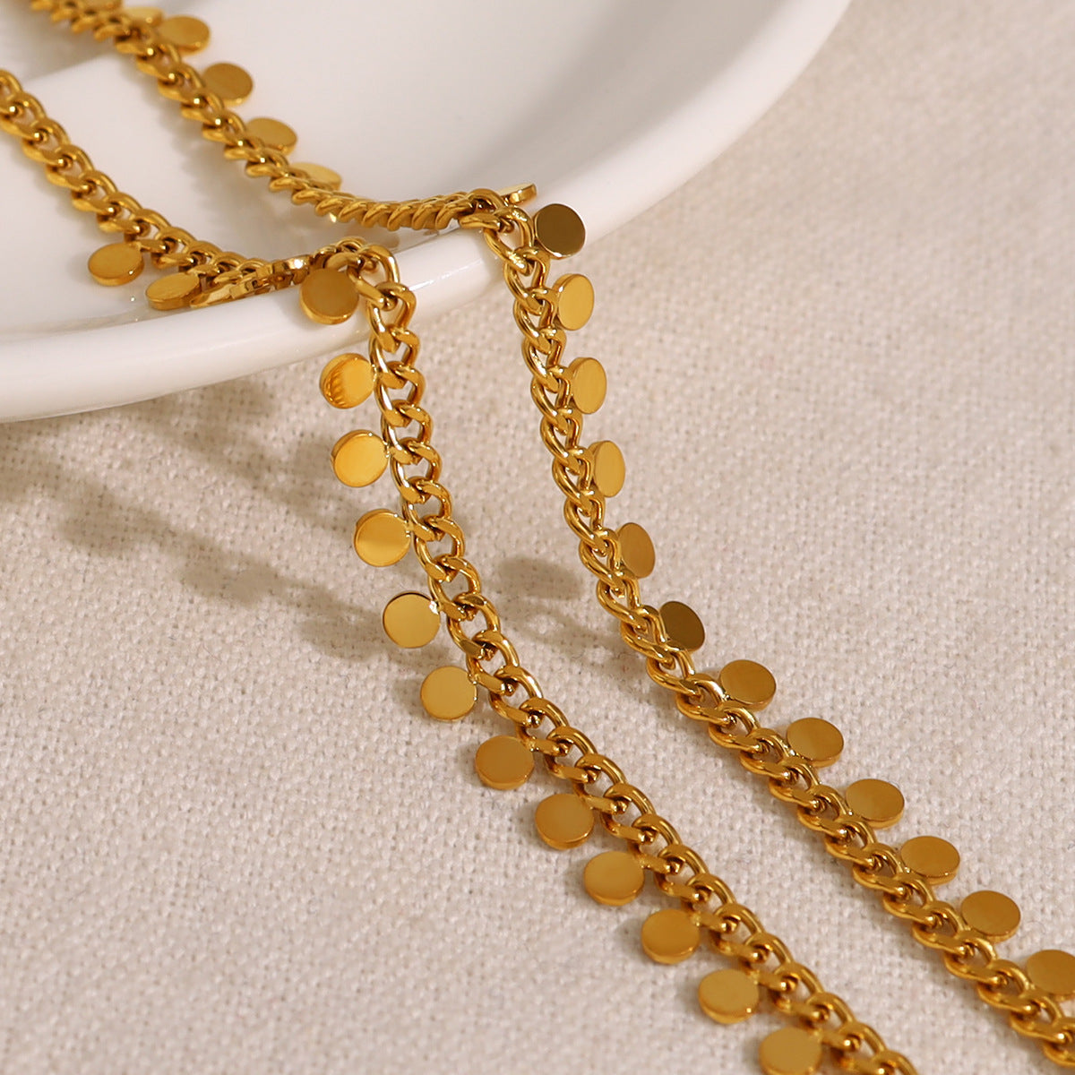 Exquisite 18K gold-plated necklace with a chain and small beads, ideal for adding a touch of elegance to any outfit.