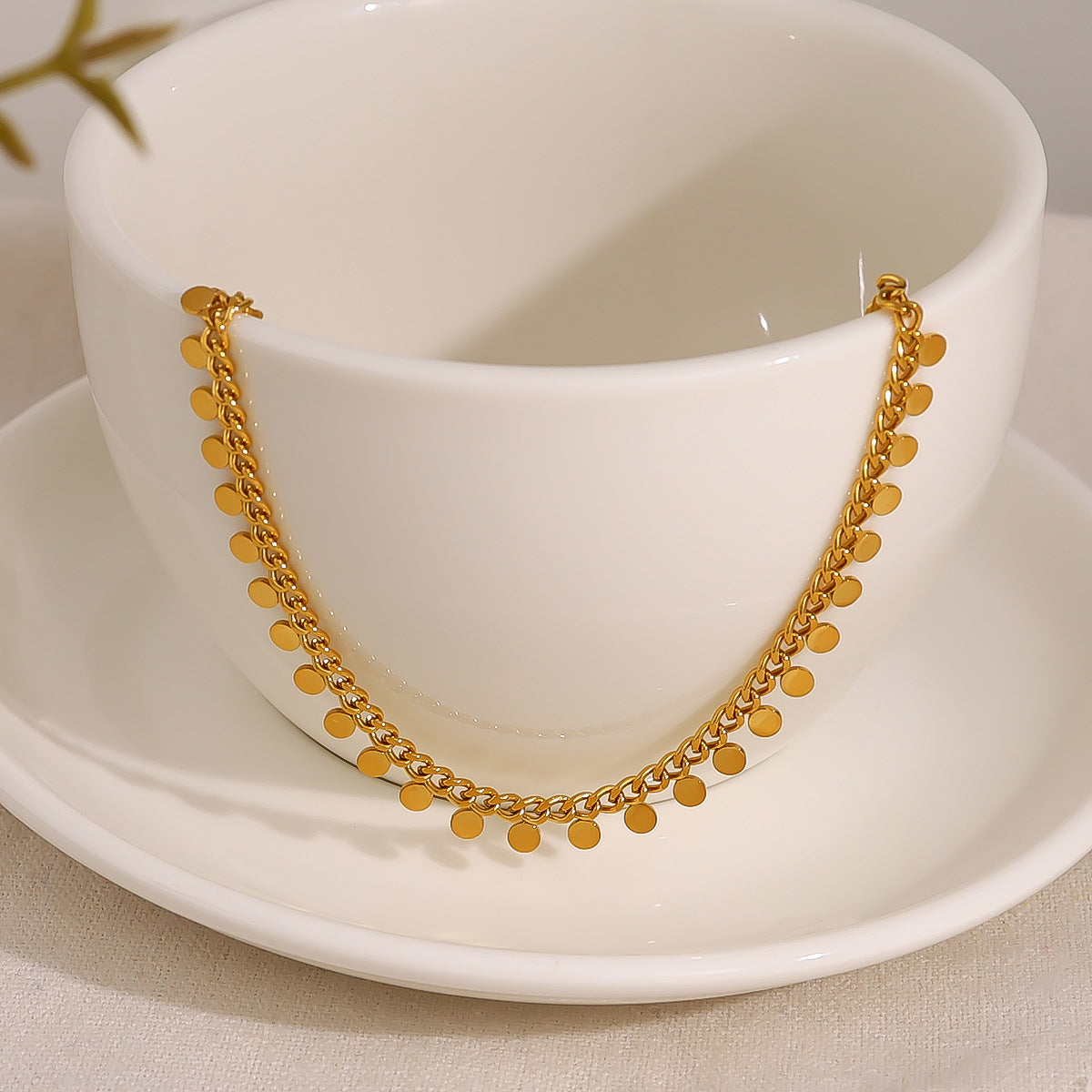 Dazzling 18K gold-plated chain necklace with small beads, offering a refined and elegant accessory for your wardrobe.