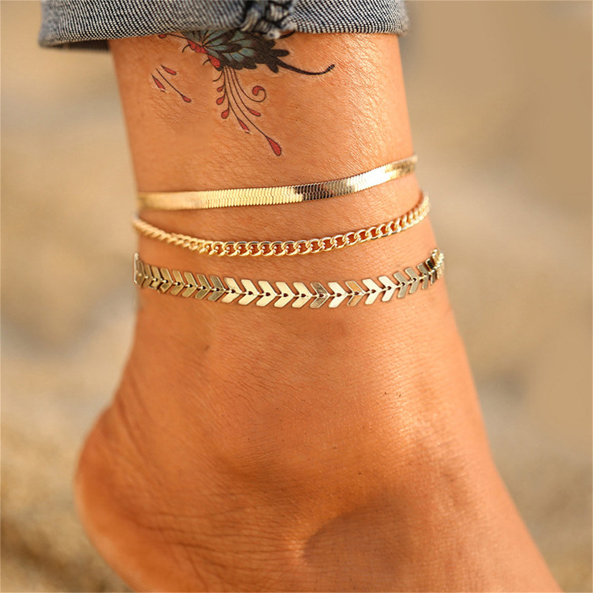 Elegant 18K gold-plated layered chain anklet, perfect for adding a touch of luxury to any outfit.