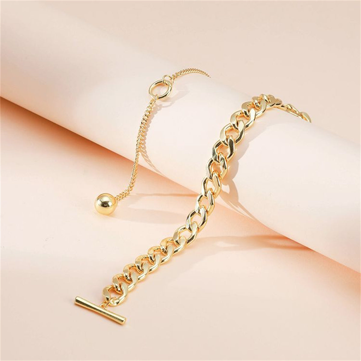 Chic 18K gold-plated chain bracelet with a charming gold accent, perfect for everyday wear or special occasions.