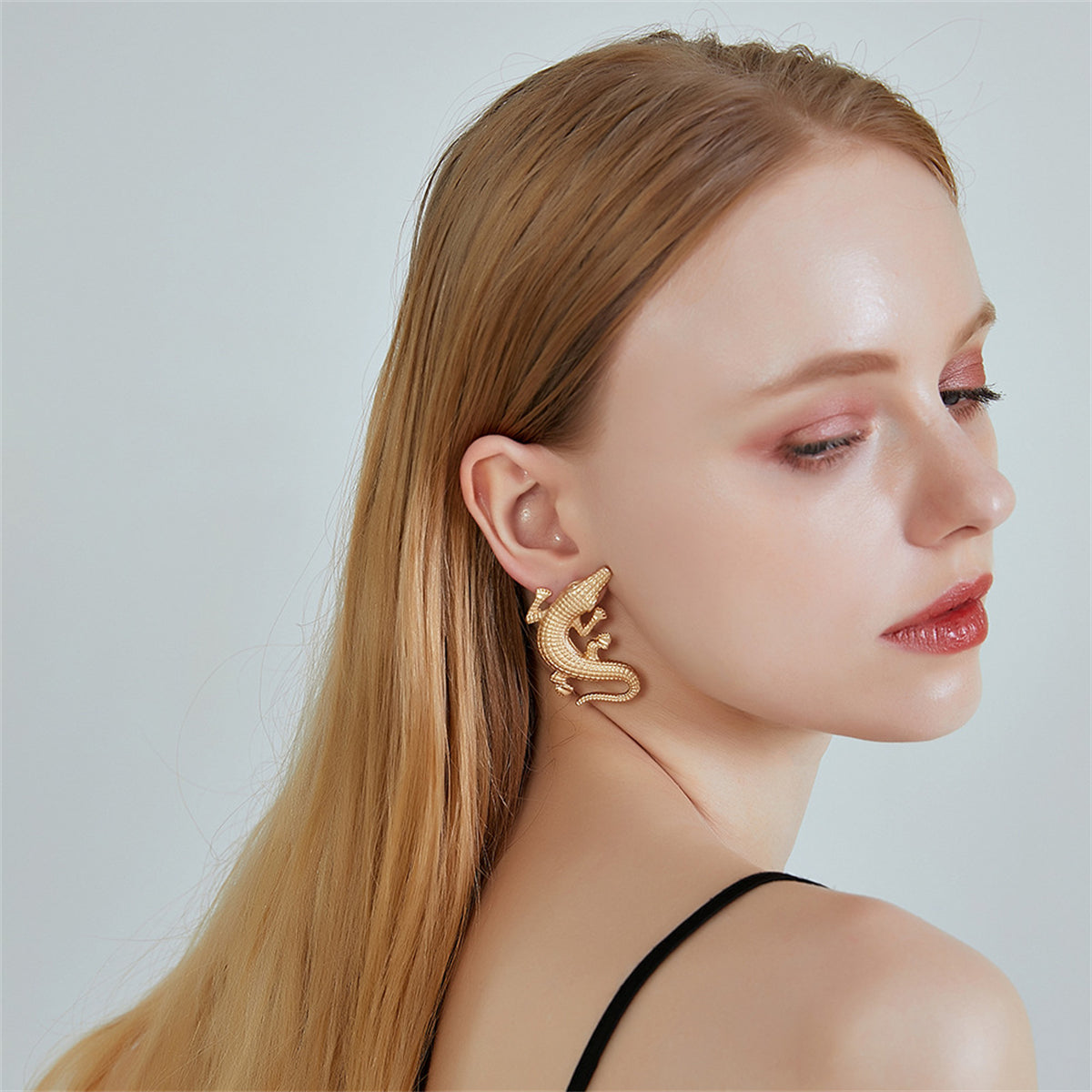 Unique 18K gold-plated alligator drop earrings, ideal for those who love bold and stylish accessories.