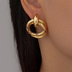 Chic 18K gold-plated interlocked earrings showcasing a twisted design, a must-have accessory for a stylish look.