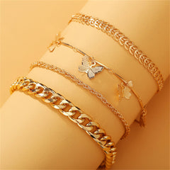 Delicate gold chain bracelet with butterfly charms, designed in 18K gold plating for a chic and playful look.