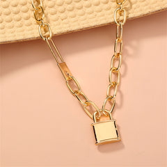 Stunning 18K gold-plated double lock pendant necklace, showcasing a chic padlock design for a fashionable statement piece.