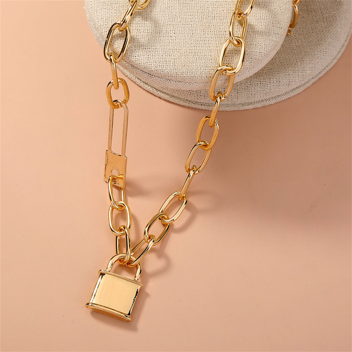 Beautifully crafted 18K gold-plated necklace with a unique double lock pendant, ideal for elevating your jewelry collection.