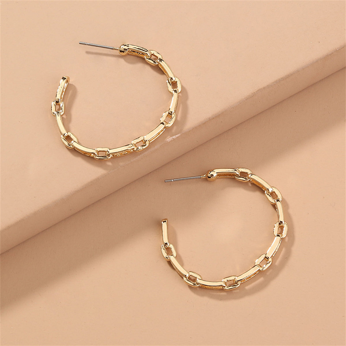 Chic 18K gold-plated chain hoop earrings with a unique link design, ideal for elevating your everyday look.