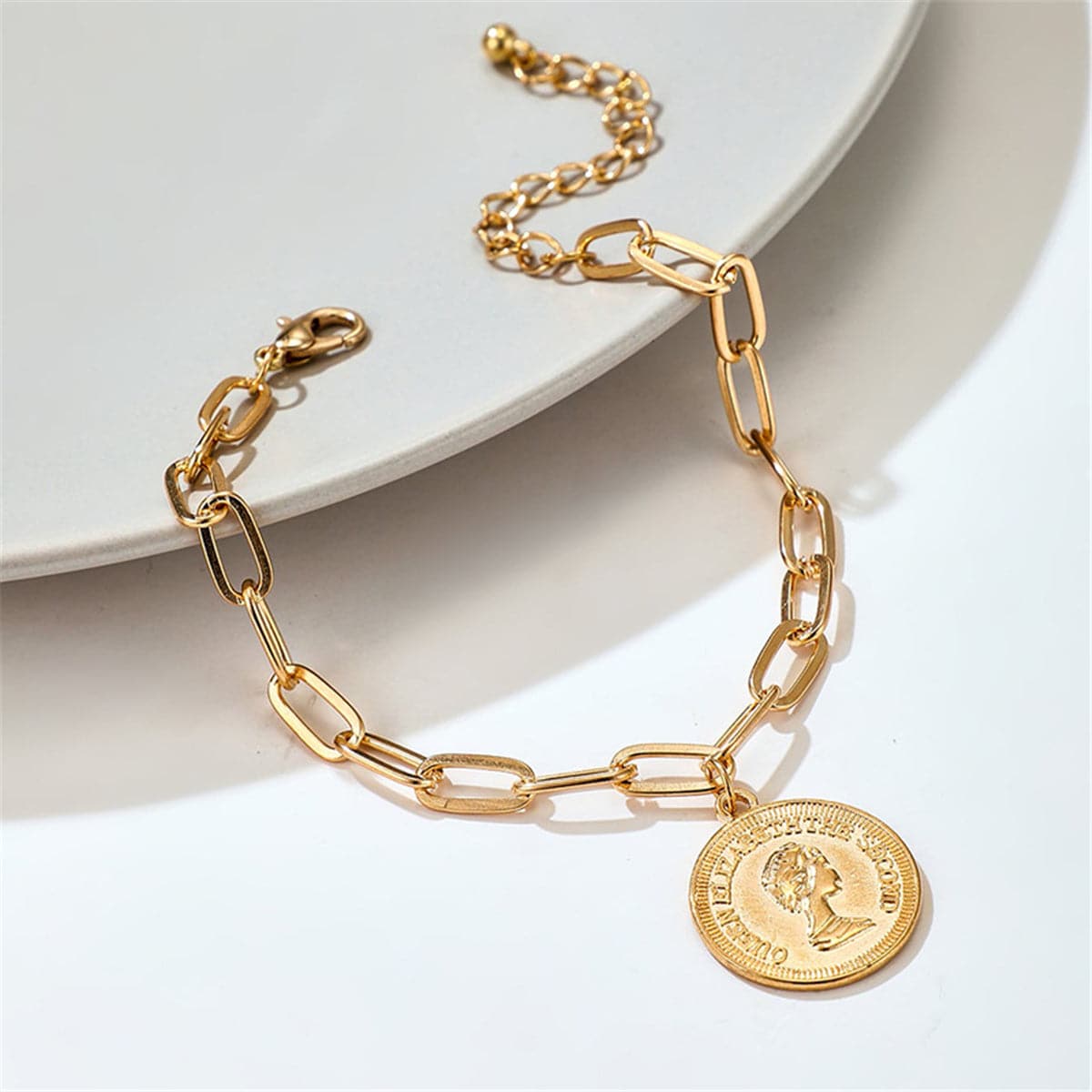 Chic 18K gold-plated anklet featuring a coin charm, a must-have accessory for those who love timeless elegance.