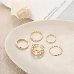 Chic gold tone ring set with 18K gold-plated cable chain design, a must-have accessory for any fashion-forward individual.