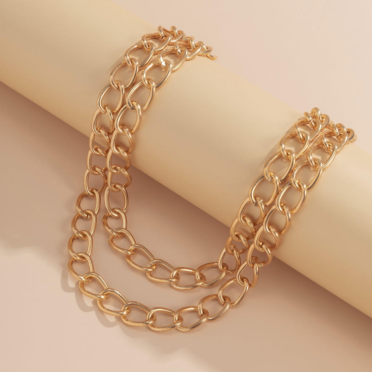 Stylish 18K gold-plated curb chain necklace with a smooth single strand of rich gold metal, perfect for any occasion.