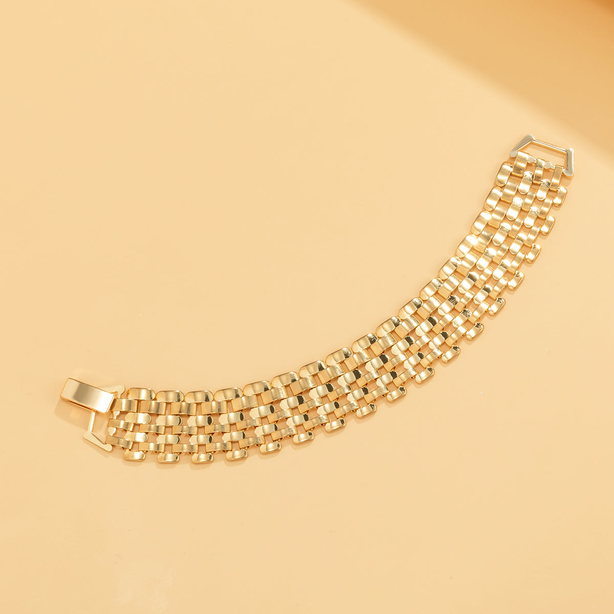 Luxurious 18K gold-plated chain bracelet in a square design, perfect for making a bold fashion statement.