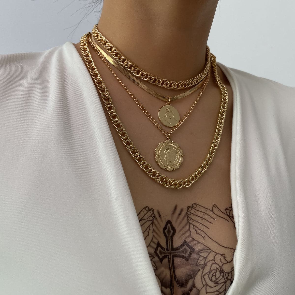 Elegant 18K gold-plated necklace featuring a layered coin charm, perfect for adding a touch of luxury to any outfit.