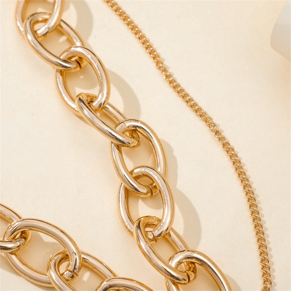 Trendy 18K gold-plated necklace with a padlock pendant, ideal for layering and enhancing any outfit with elegance.