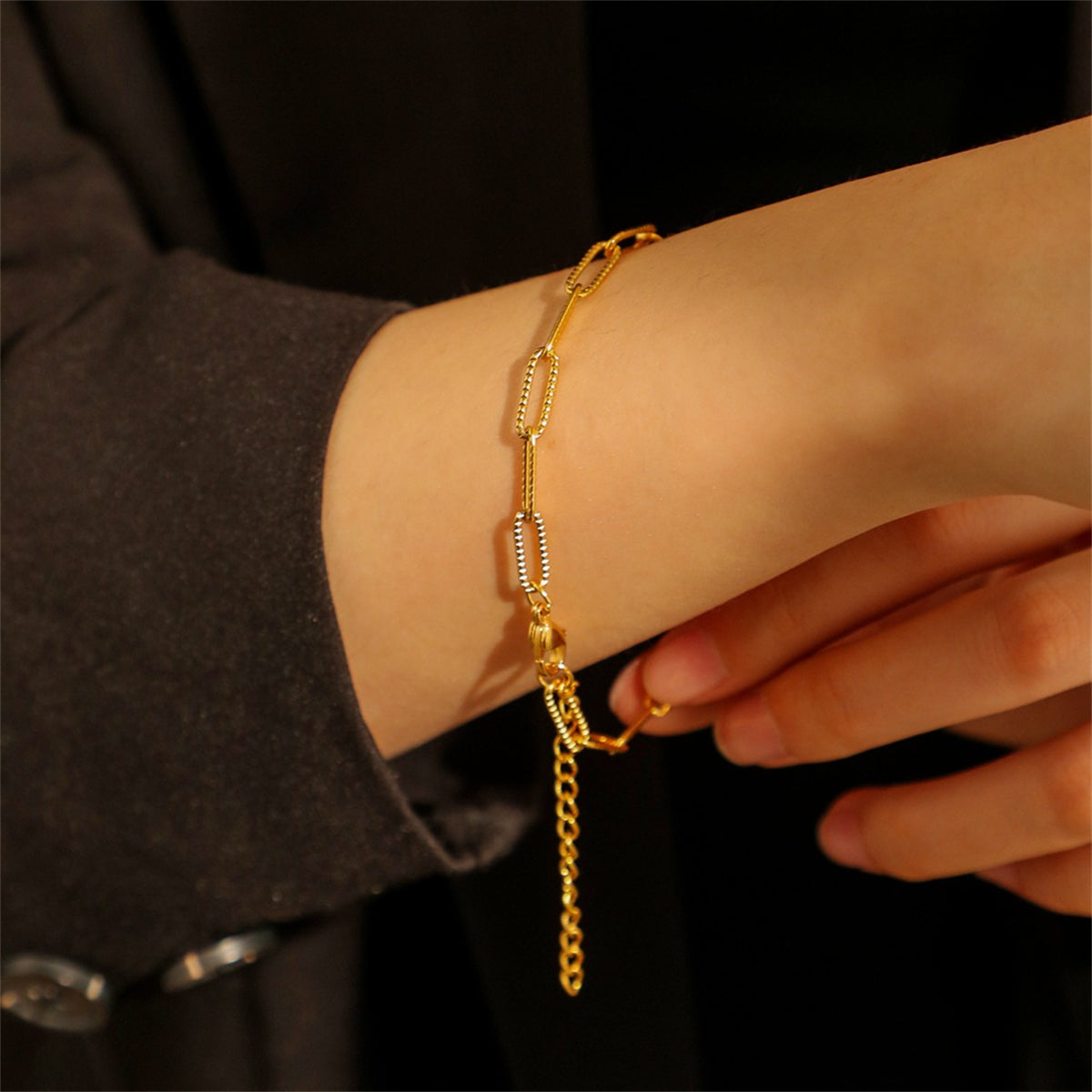 Elegant 18K gold-plated cut rectangle chain bracelet featuring a delicate small link design.