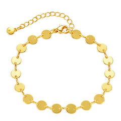 Elegant 18K gold-plated bracelet featuring stylish circles and discs, perfect for adding a touch of luxury to any outfit.