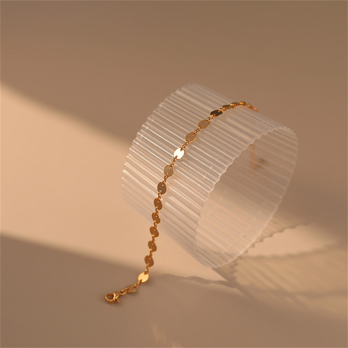 Beautifully crafted 18K gold-plated bracelet with unique circles and discs, ideal for enhancing your everyday elegance.