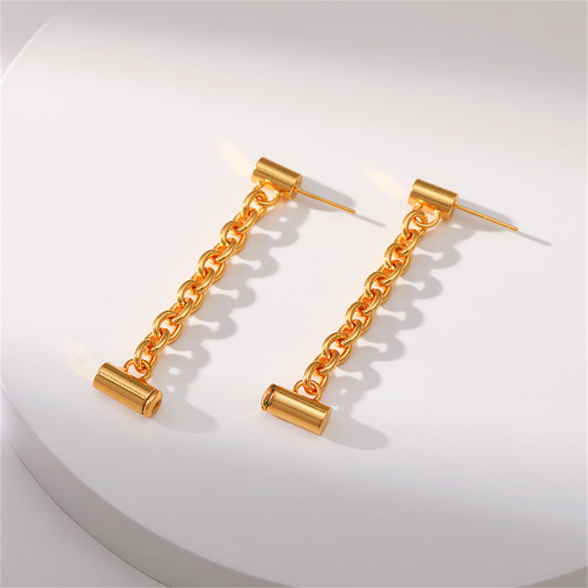 Eye-catching 18K gold-plated earrings featuring a round bar design, perfect for enhancing your outfit with sophistication.