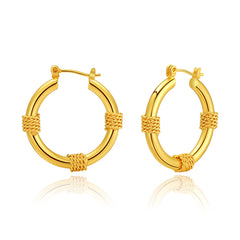 Elegant 18K gold-plated huggie earrings featuring twisted rope design, perfect for adding a touch of sophistication to any outfit.