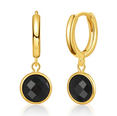 Black crystal hoop earrings with a gold-plated finish, featuring a round huggie design in 18K gold.