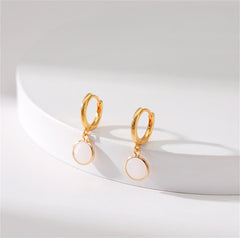 Elegant 18K gold-plated huggie earrings adorned with white crystal, perfect for any occasion.