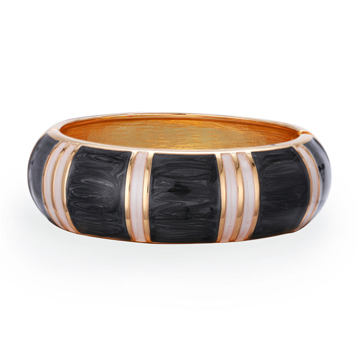 A stylish black and white bracelet adorned with gold and white stripes, made from black enamel and 18K gold-plated bamboo.