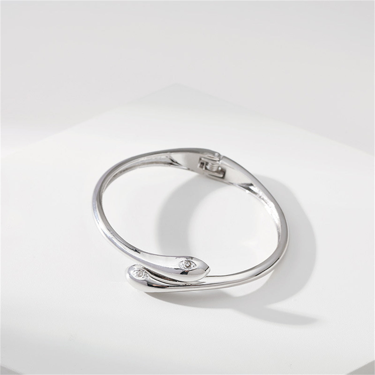 Cubic Zirconia & Silver-Plated Double Snakes Bypass Hinged Bangle