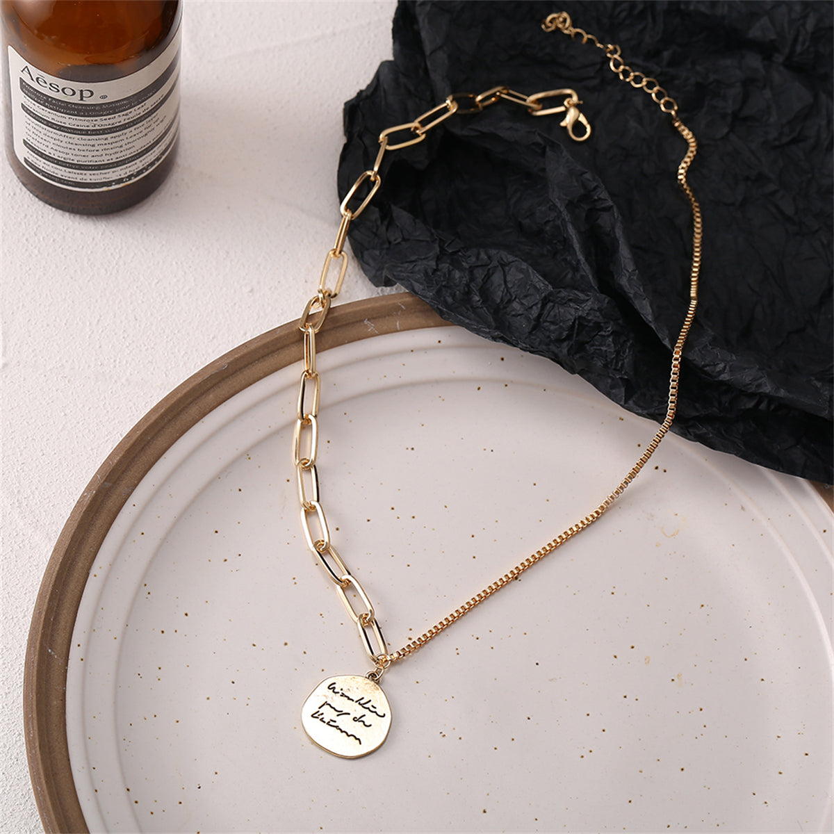 Unveil your unique style with our 18K gold-plated coin pendant necklace. This luxurious piece is designed to turn heads and elevate your everyday wear.