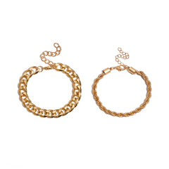 A chic pair of 18K gold-plated chain bracelets, featuring a curb and rope design, elegantly showcasing chain links.