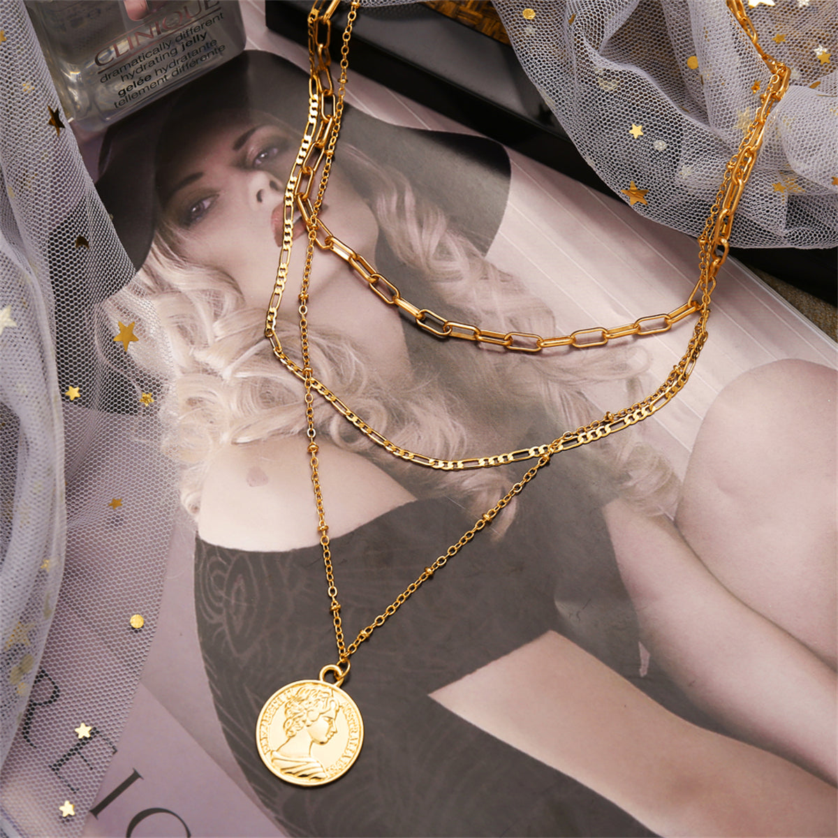 Dazzling 18K gold-plated necklace with a coin pendant, a timeless piece that adds sophistication to your jewelry ensemble.