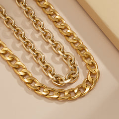 Luxurious 18K gold-plated curb chain necklace set, perfect for making a bold fashion statement.