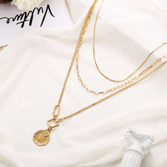 Beautiful 18K gold-plated necklace showcasing a coin charm, perfect for adding a trendy flair to any ensemble.