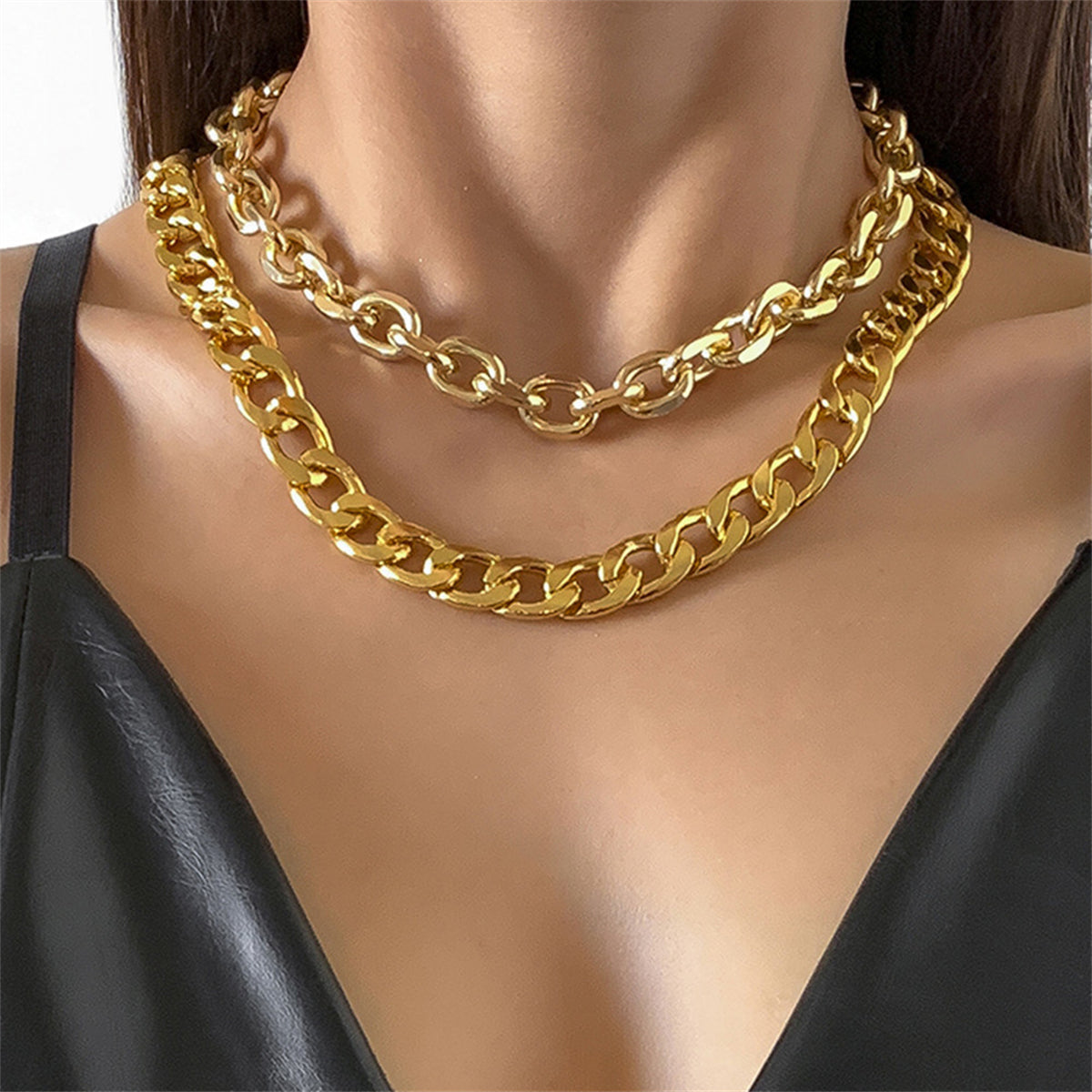 Elegant 18K gold-plated curb chain necklace set, perfect for adding a touch of luxury to any outfit.