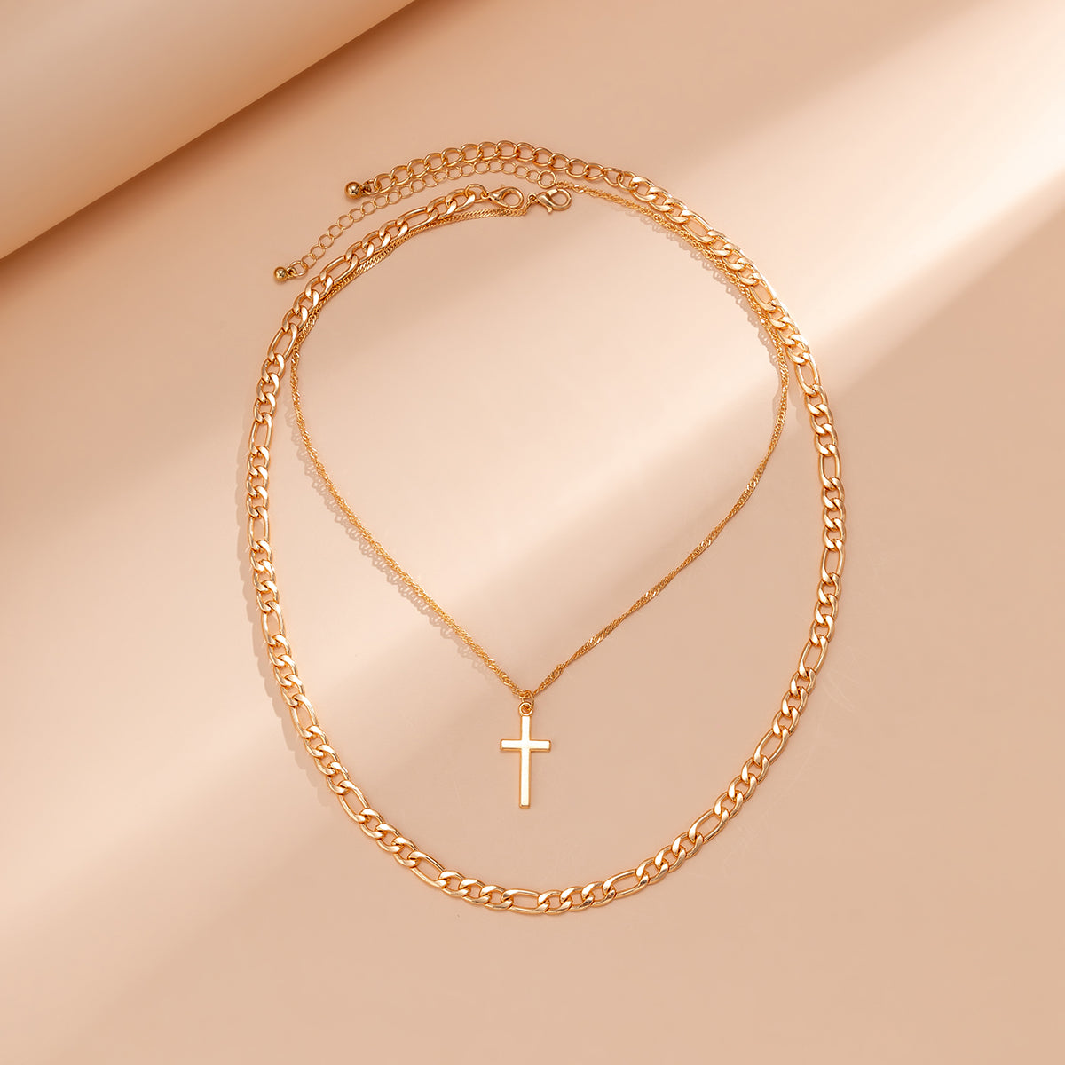 Dazzling 18K gold-plated necklace adorned with a cross pendant, a timeless piece that enhances any jewelry collection.