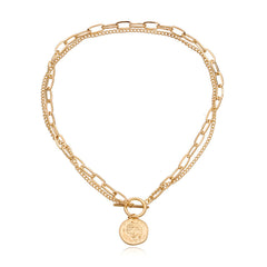 Dazzling gold chain necklace showcasing a coin pendant, a must-have piece for those who love timeless elegance.