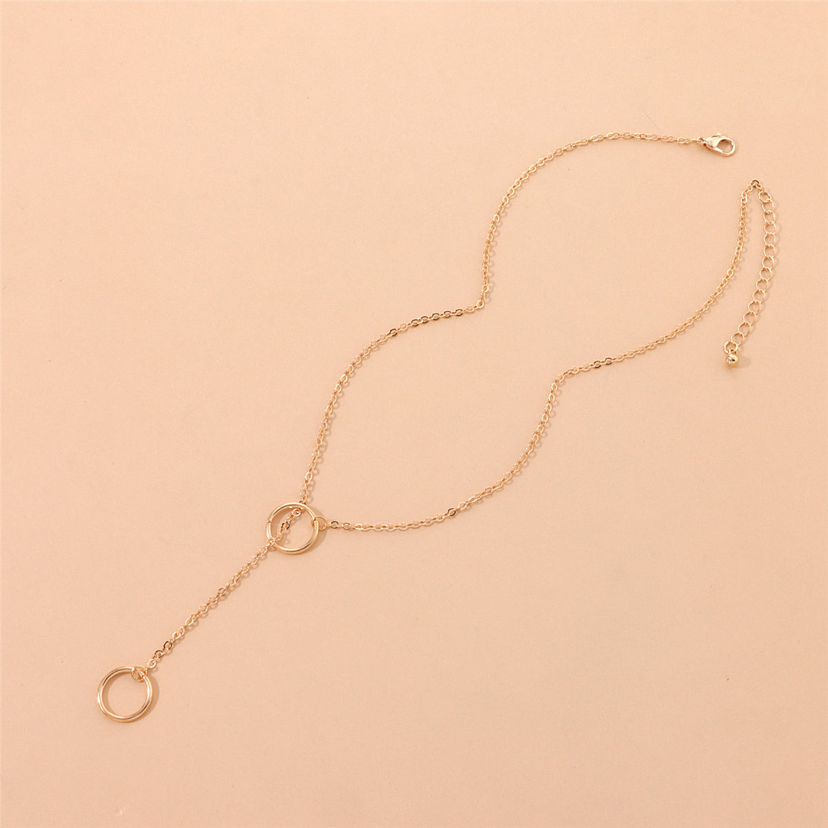 Chic 18K gold-plated rose gold necklace featuring two elegant circles, perfect for elevating your jewelry collection.